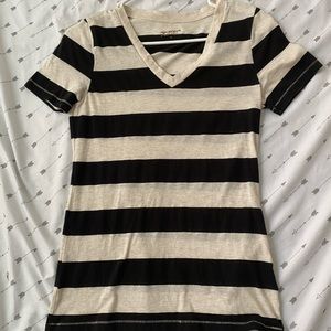 Black and cream colored v neck